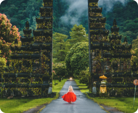 Girl walking through gates.
